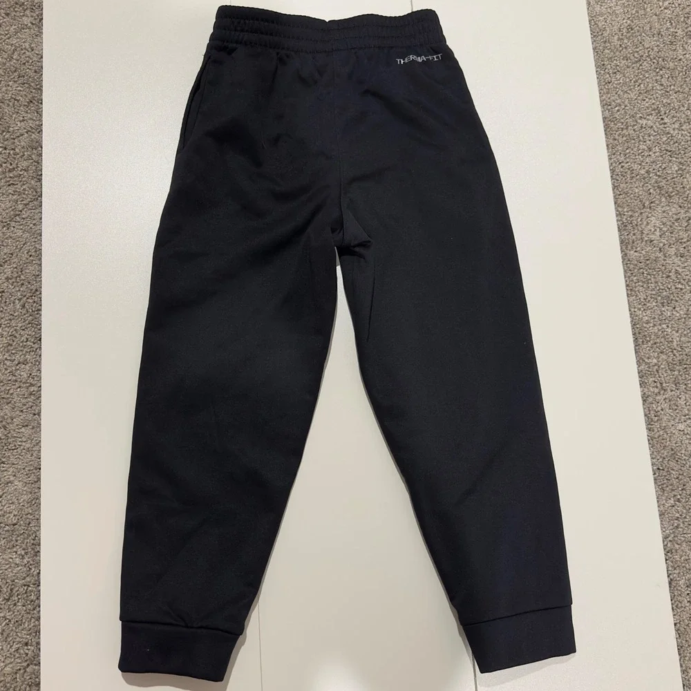 Nike Kids Therma-FIT Joggers Black Graphic Swoosh Sweatpants N274-J4R Size 7 6-7